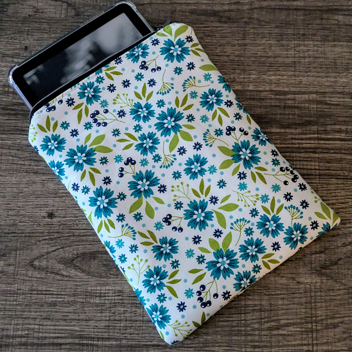 Floral patterned case on a wooden surface