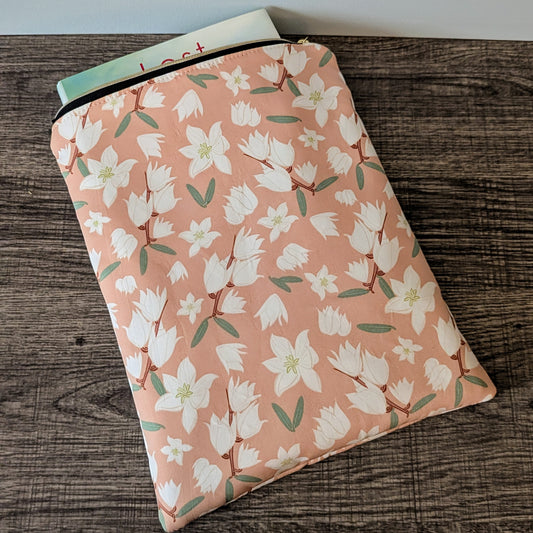 Floral-patterned notebook on a wooden surface