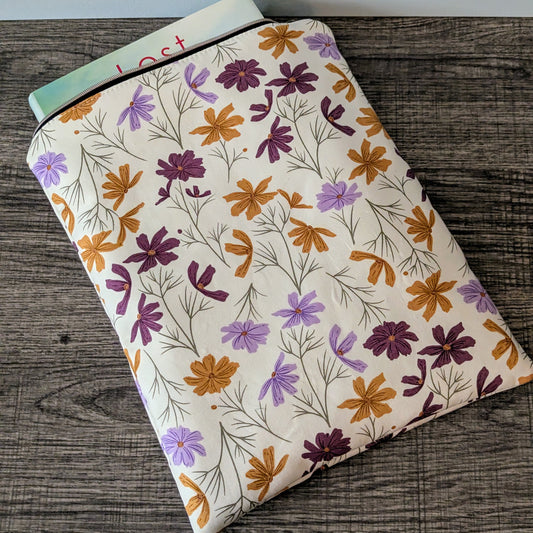 Floral-patterned pouch on a wooden surface